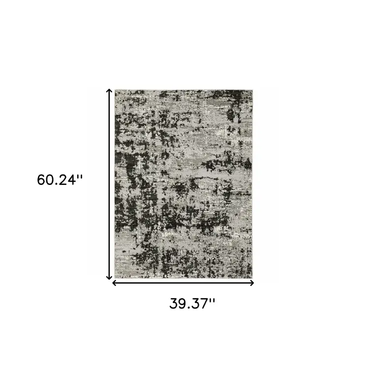 3' X 5' Grey Charcoal Black And Ivory Abstract Power Loom Stain Resistant Area Rug