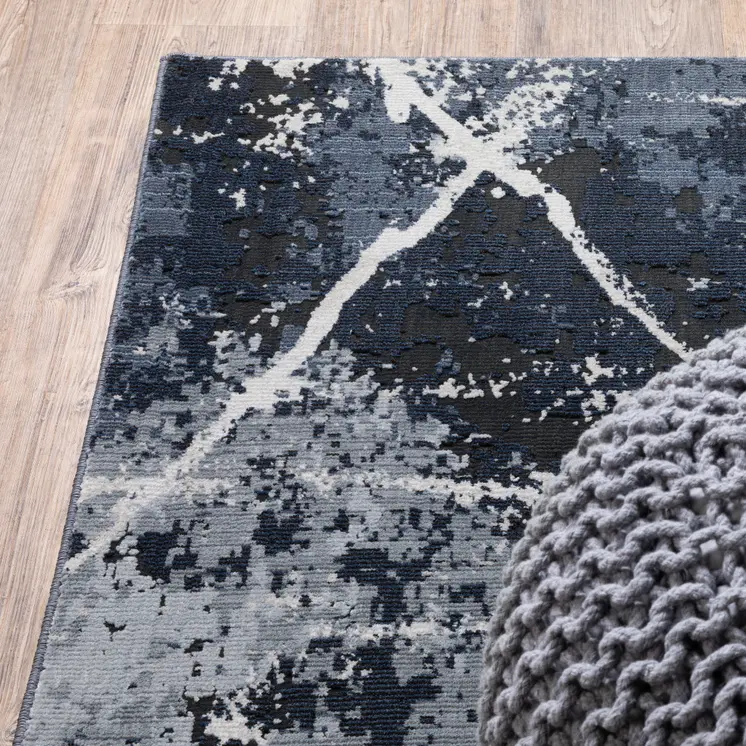 7' X 10' Blue Gray And Black Abstract Area Rug