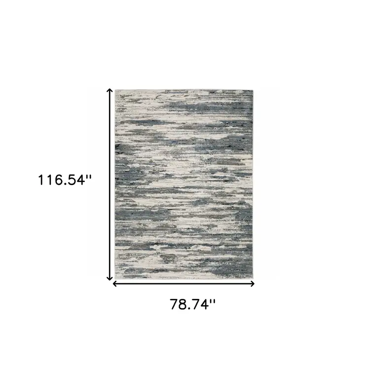 6' X 9' Blue Grey Beige And Brown Abstract Power Loom Stain Resistant Area Rug