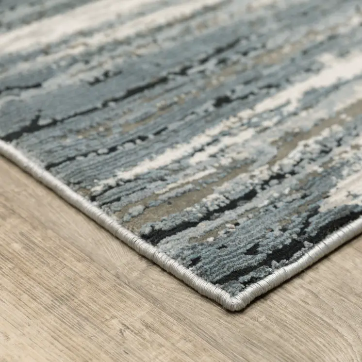 6' X 9' Blue Grey Beige And Brown Abstract Power Loom Stain Resistant Area Rug