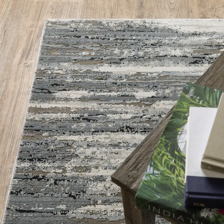 6' X 9' Blue Grey Beige And Brown Abstract Power Loom Stain Resistant Area Rug