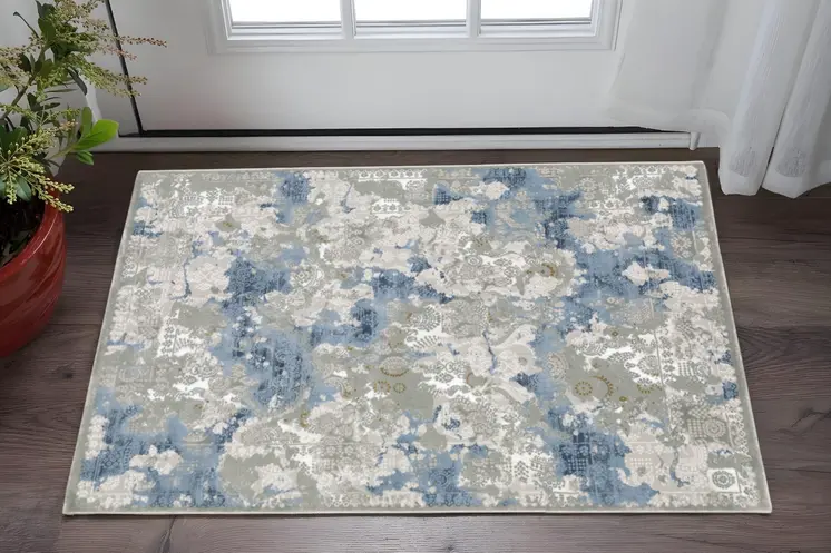 3' X 5' Grey Blue Ivory Navy Beige And Brown Abstract Power Loom Stain Resistant Area Rug