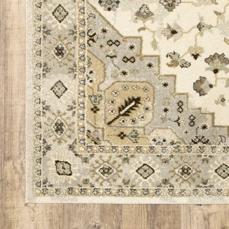 8' X 11' Beige Grey Tan And Brown Oriental Power Loom Stain Resistant Area Rug