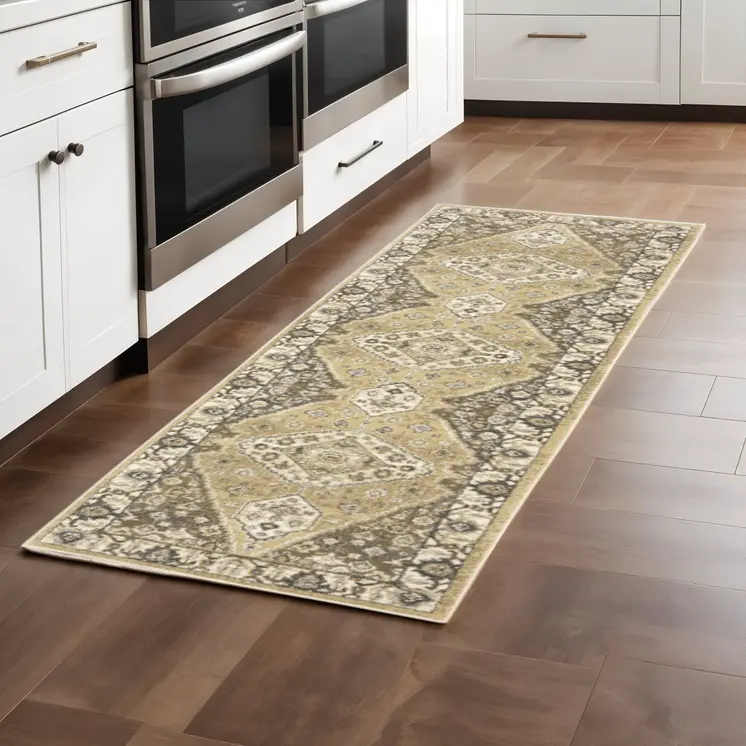 2' X 8' Beige Grey Tan And Charcoal Oriental Power Loom Stain Resistant Runner Rug