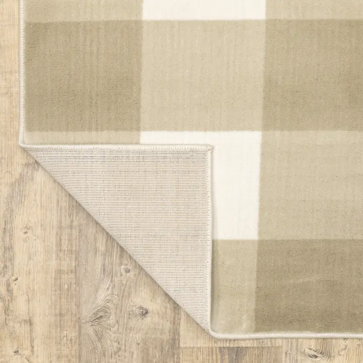 7' X 9' Beige And Ivory Geometric Area Rug