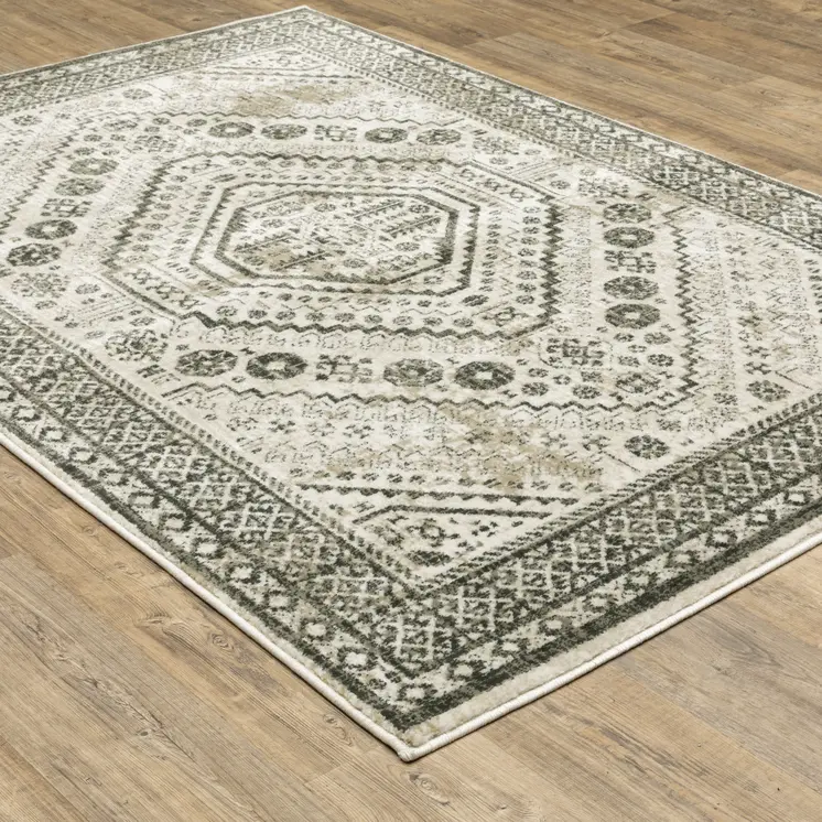 4' X 6' Ivory Grey Black And Ivory Oriental Power Loom Stain Resistant Area Rug