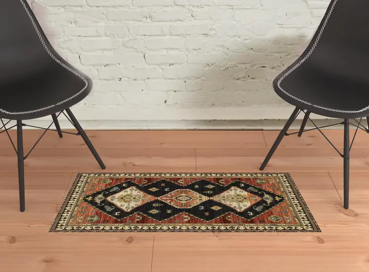 2' X 3' Charcoal Brown Orange Salmon Gold Navy Ivory And Pale Blue Oriental Power Loom Stain Resistant Area Rug With Fringe