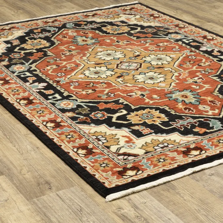 3' X 5' Black Orange And Beige Oriental Power Loom Stain Resistant Area Rug With Fringe