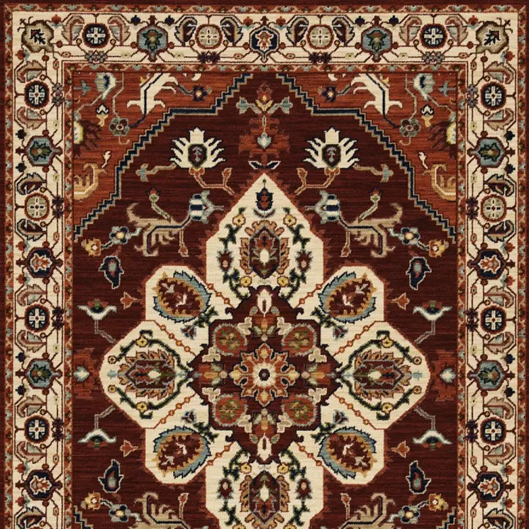 5' X 8' Red Ivory Orange And Blue Oriental Power Loom Stain Resistant Area Rug With Fringe