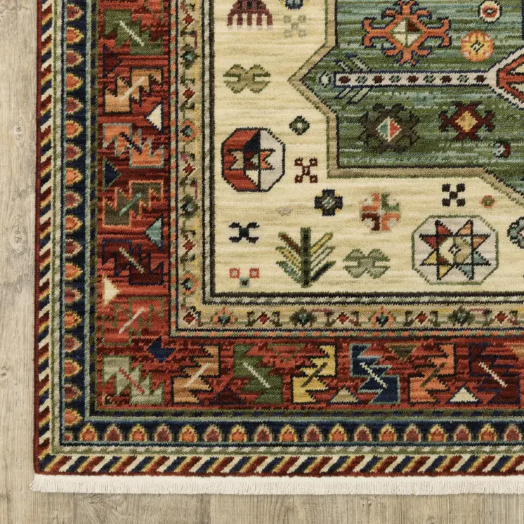 5' X 8' Red Blue And Beige Oriental Area Rug With Fringe
