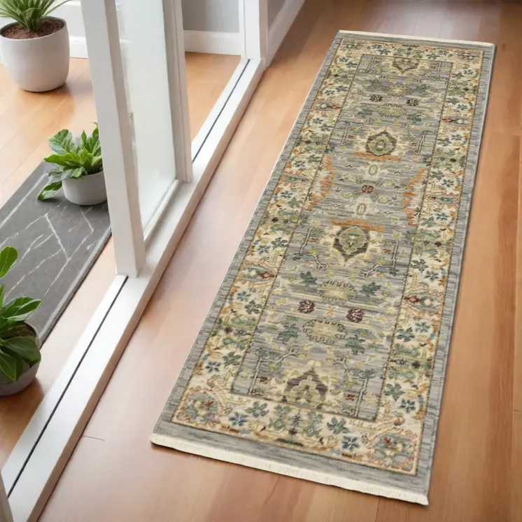 2' X 6' Grey Ivory Orange Teal Green Charcoal Blue And Red Oriental Power Loom Stain Resistant Runner Rug With Fringe