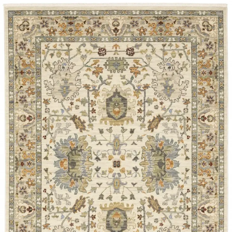 2' X 6' Ivory Grey Orange Green Blue And Red Oriental Power Loom Stain Resistant Runner Rug With Fringe