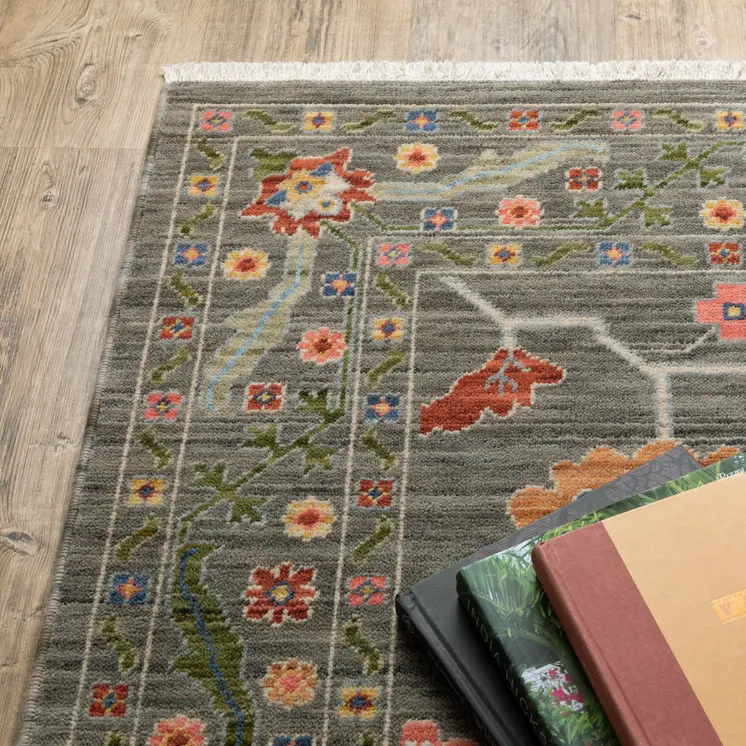 6' X 9' Grey Blue Pink Orange Rust Red Green And Ivory Oriental Power Loom Stain Resistant Area Rug With Fringe