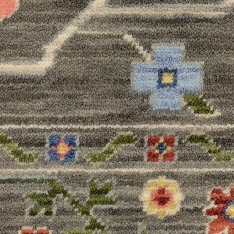 6' X 9' Grey Blue Pink Orange Rust Red Green And Ivory Oriental Power Loom Stain Resistant Area Rug With Fringe