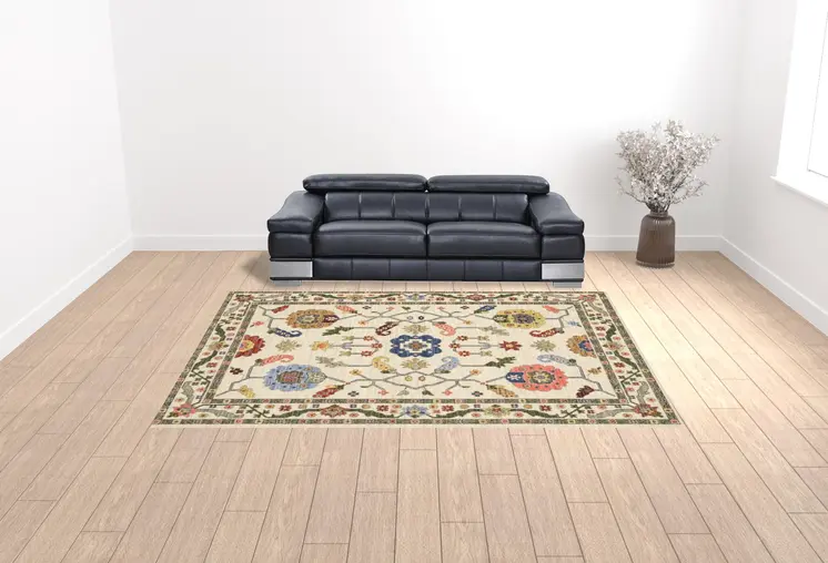 10' X 13' Ivory Green Blues Pink Yellow Rust Brown Tan And Grey Oriental Power Loom Stain Resistant Area Rug With Fringe
