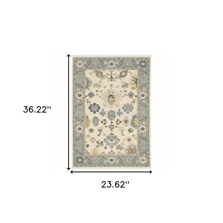 2' X 3' Ivory Blue Grey Teal Gold Green And Rust Oriental Power Loom Stain Resistant Area Rug With Fringe