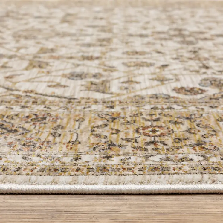 10' X 13' Ivory And Gold Oriental Power Loom Stain Resistant Area Rug With Fringe