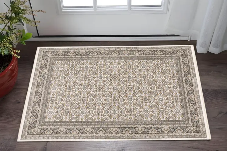 3' X 5' Ivory And Grey Oriental Power Loom Stain Resistant Area Rug With Fringe
