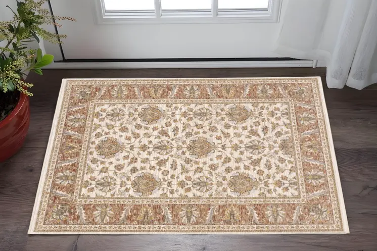 2' X 3' Rust And Ivory Oriental Power Loom Stain Resistant Area Rug With Fringe