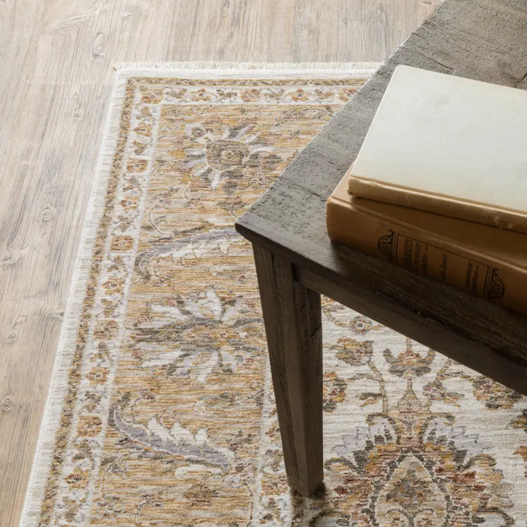 7' X 10' Ivory And Gold Oriental Area Rug With Fringe