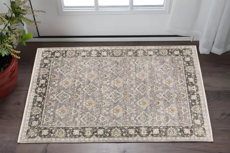 3' X 5' Grey And Blue Oriental Power Loom Stain Resistant Area Rug With Fringe