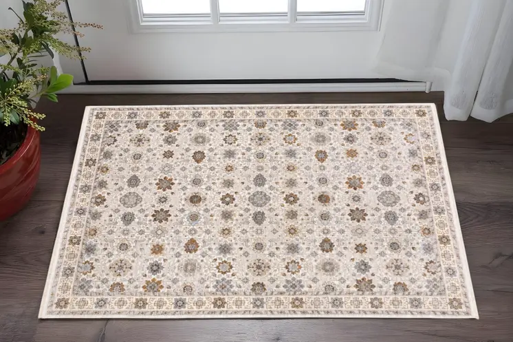 3' X 5' Ivory And Gold Oriental Power Loom Stain Resistant Area Rug With Fringe