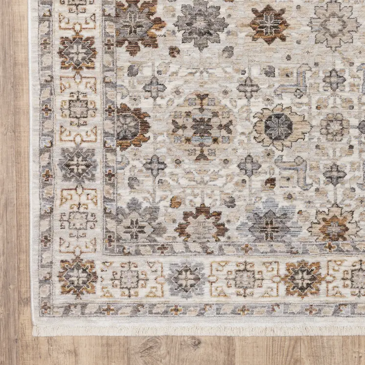 8' X 11' Ivory And Gold Oriental Power Loom Stain Resistant Area Rug With Fringe
