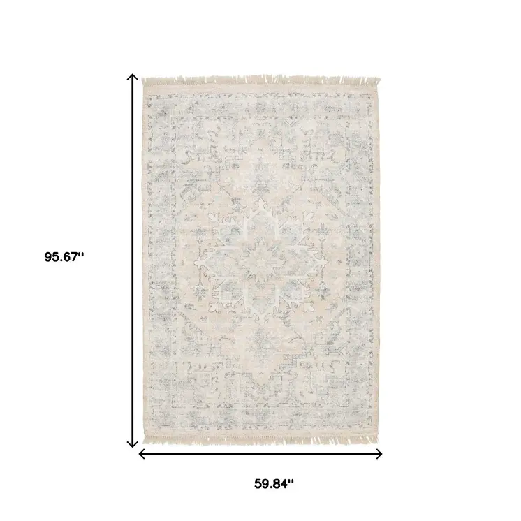 5' X 8' Beige And Grey Oriental Hand Loomed Stain Resistant Area Rug With Fringe