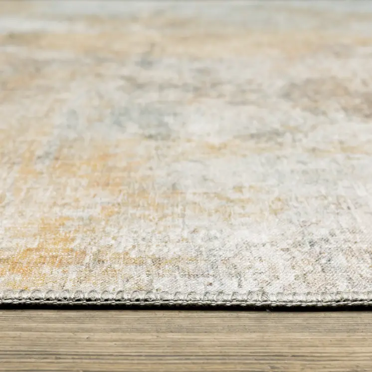 9' X 12' Yellow And Blue Abstract Area Rug