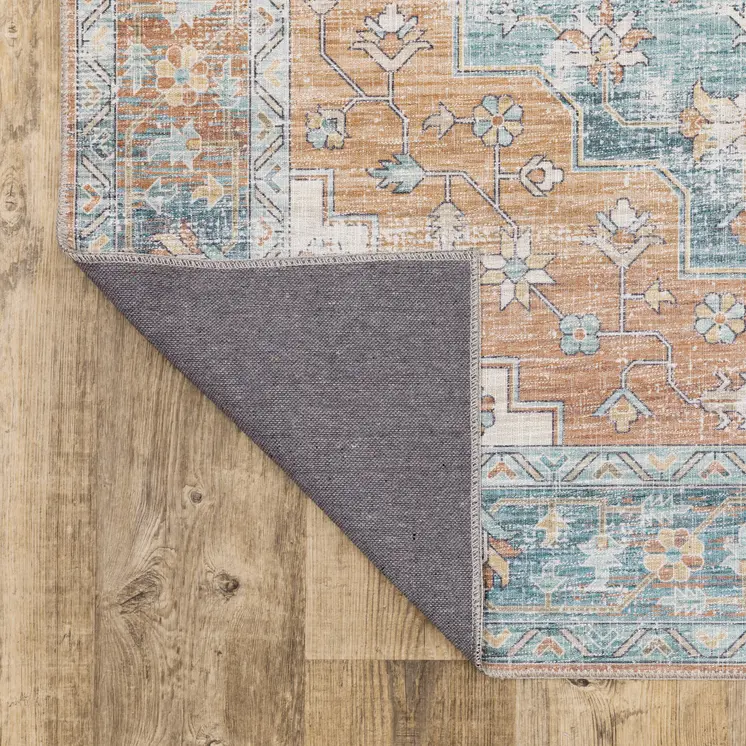 5' X 7' Orange Blue Teal Green And Beige Oriental Power Loom Stain Resistant Area Rug