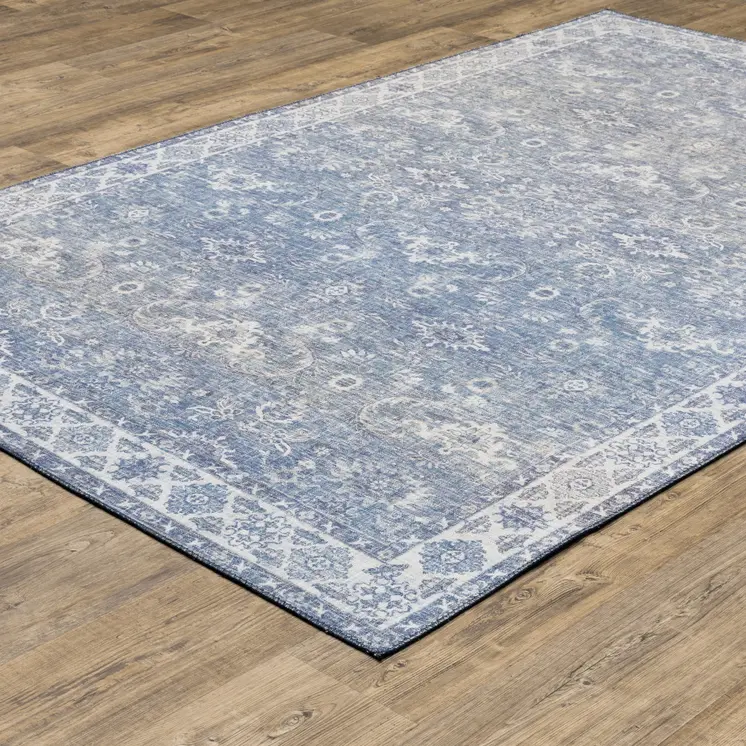 9' X 12' Blue And Ivory Oriental Distressed Area Rug