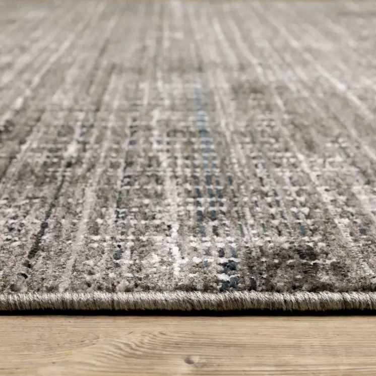 5' X 8' Charcoal Grey Grey Ivory Tan And Brown Abstract Power Loom Stain Resistant Area Rug