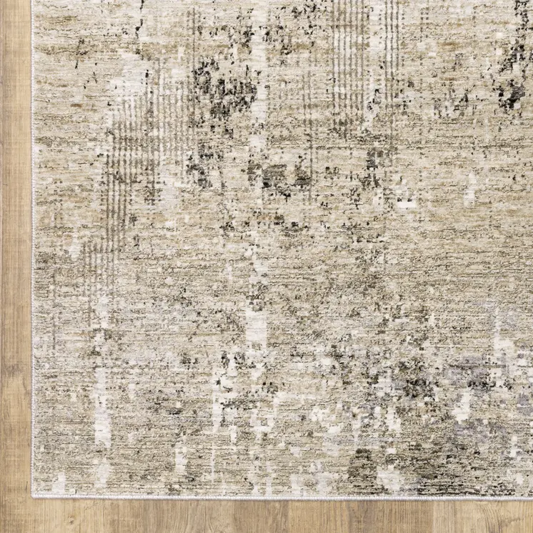 5' X 8' Beige Grey Ivory Tan And Brown Abstract Power Loom Stain Resistant Area Rug