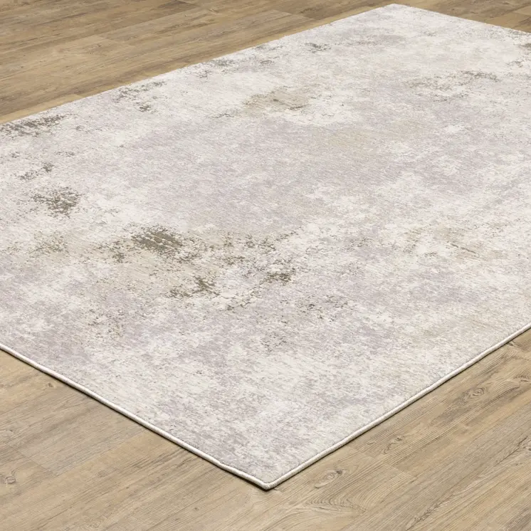 7' X 10' Ivory And Beige Abstract Distressed Area Rug