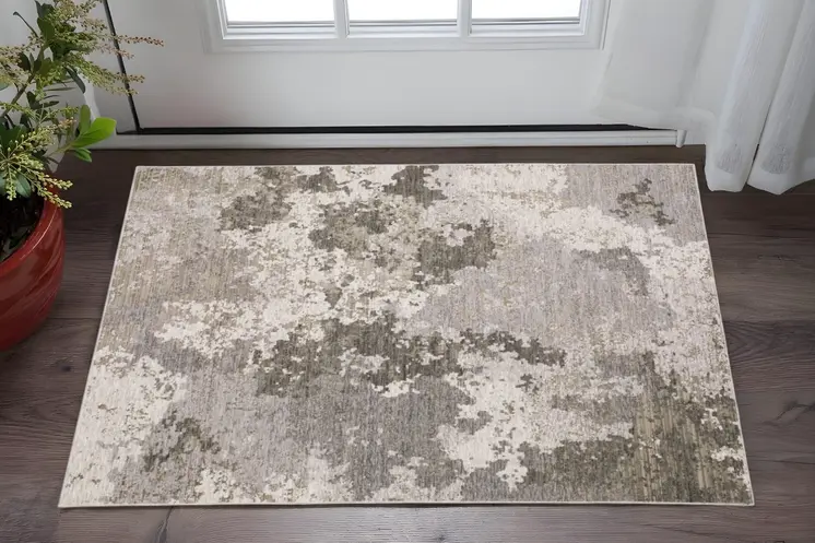 3' X 5' Grey Ivory Beige Tan Brown And Black Abstract Power Loom Stain Resistant Area Rug