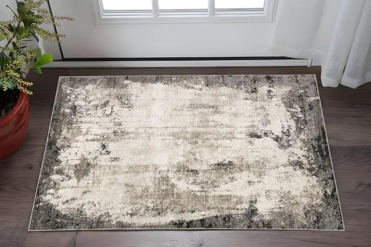 3' X 5' Grey Ivory Charcoal Tan Black And Beige Abstract Power Loom Stain Resistant Area Rug