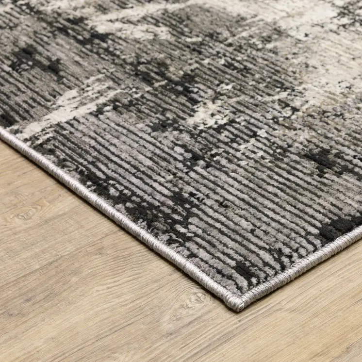 3' X 5' Grey Ivory Charcoal Tan Black And Beige Abstract Power Loom Stain Resistant Area Rug