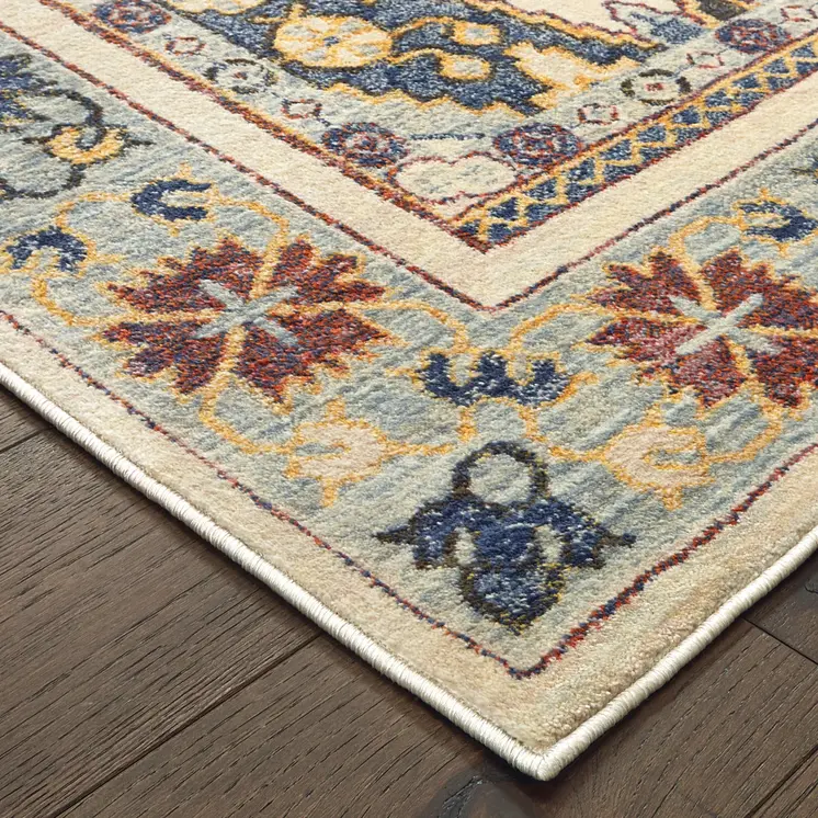 10' X 13' Ivory And Blue Oriental Power Loom Stain Resistant Area Rug