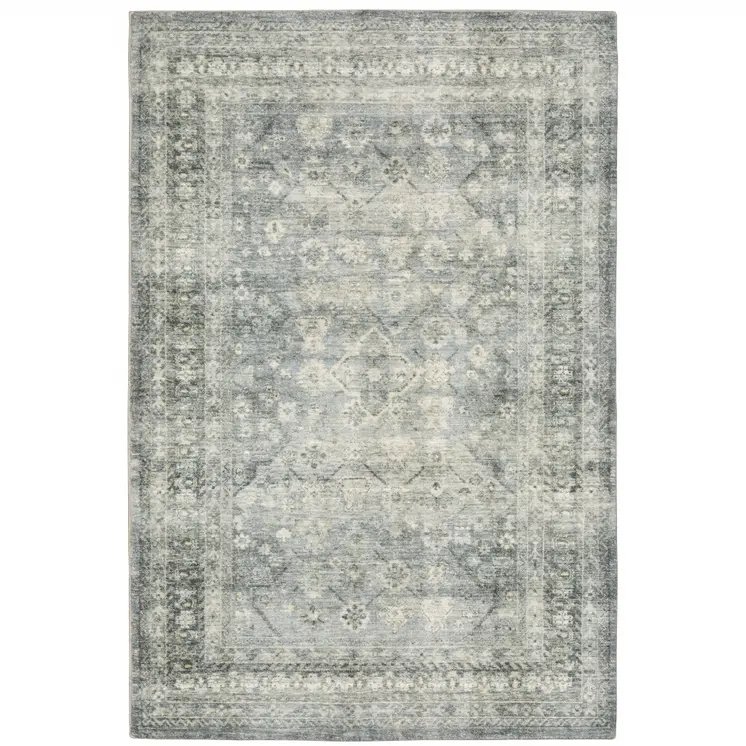 5' X 7' Blue Ivory And Grey Oriental Power Loom Stain Resistant Area Rug
