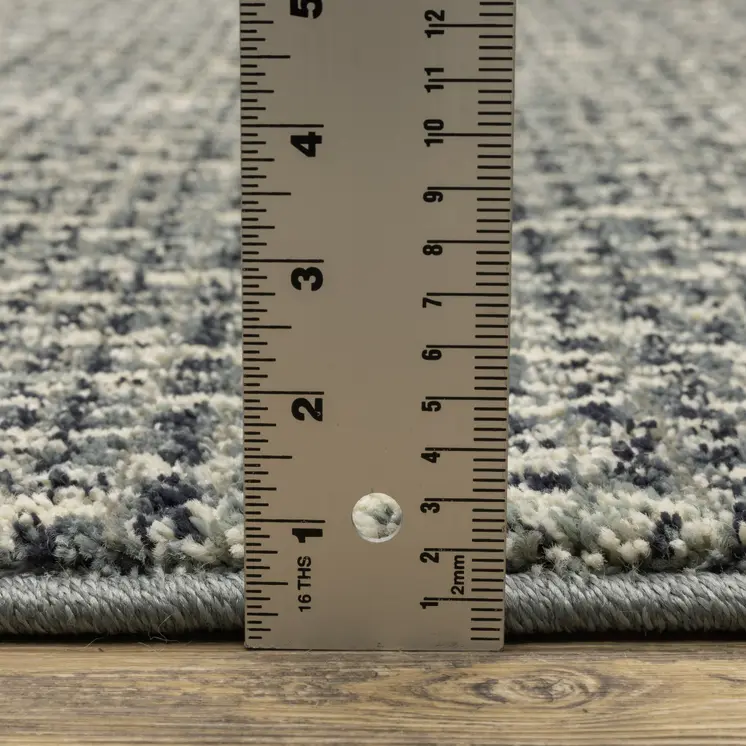 10' X 13' Blue And Ivory Geometric Distressed Area Rug