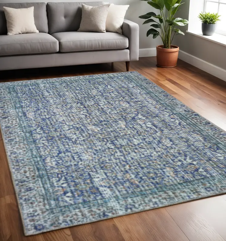 5' X 8' Blue And Grey Oriental Power Loom Stain Resistant Area Rug