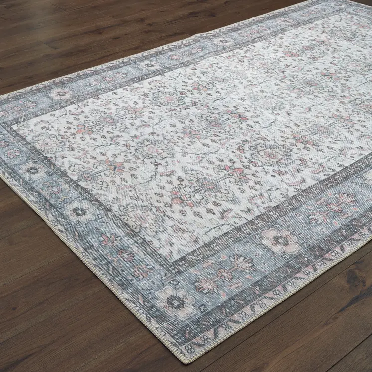 8' X 11' Ivory And Blue Oriental Power Loom Stain Resistant Area Rug