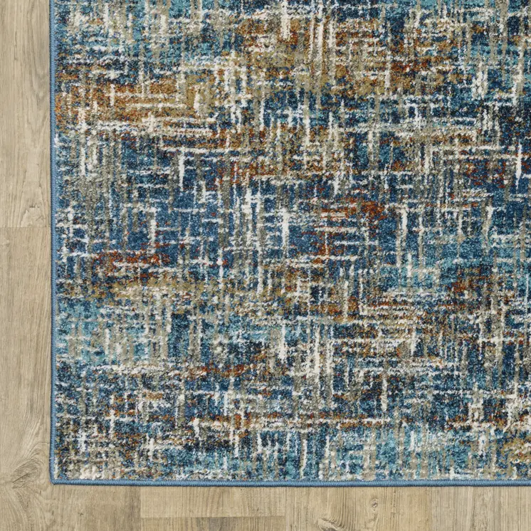 7' X 9' Blue And Beige Abstract Area Rug