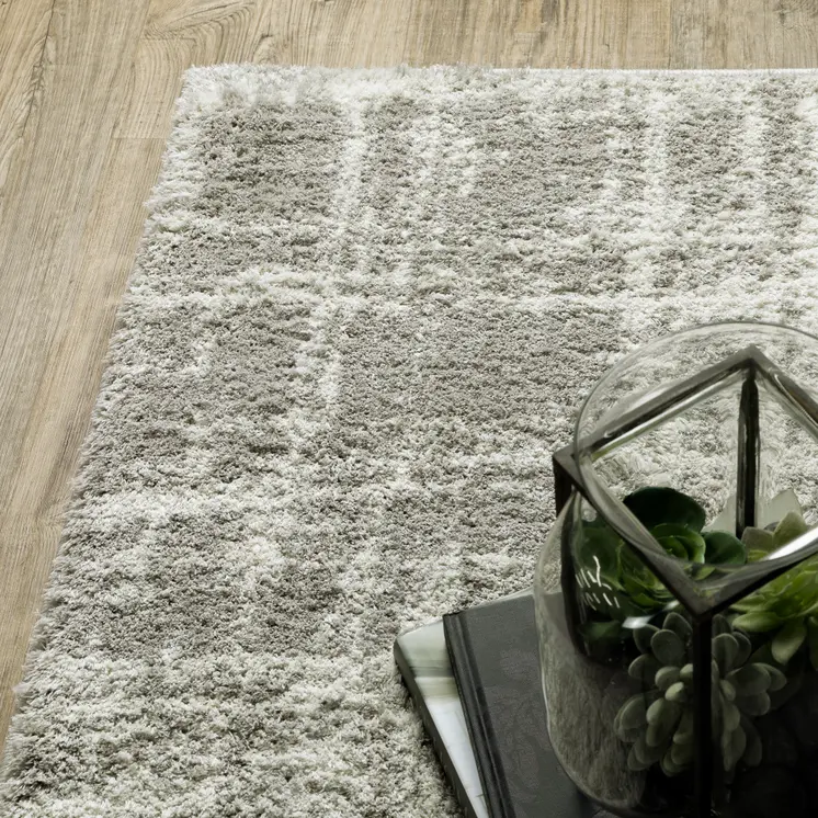 6' X 9' Grey And Ivory Abstract Shag Power Loom Stain Resistant Area Rug
