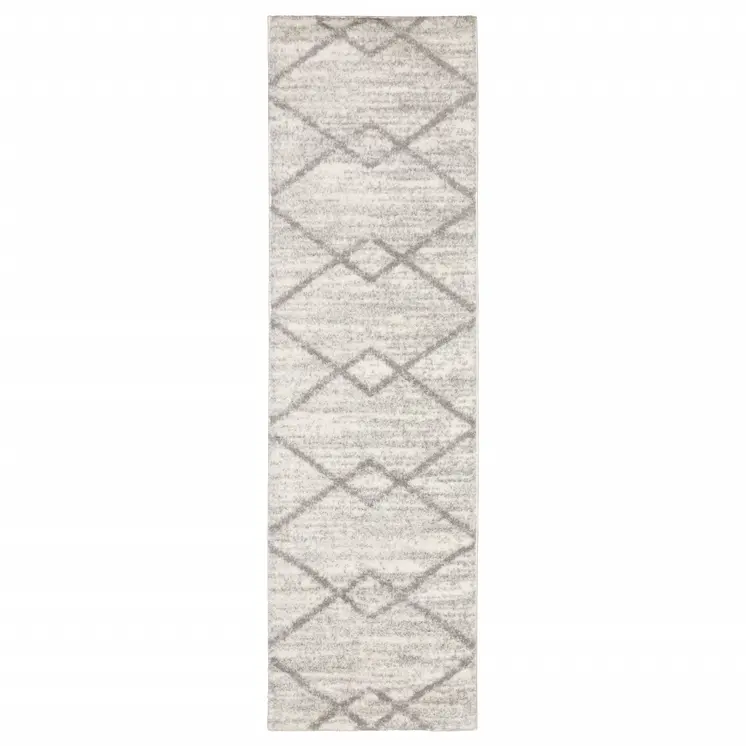 2' X 8' Ivory And Grey Geometric Shag Power Loom Stain Resistant Runner Rug