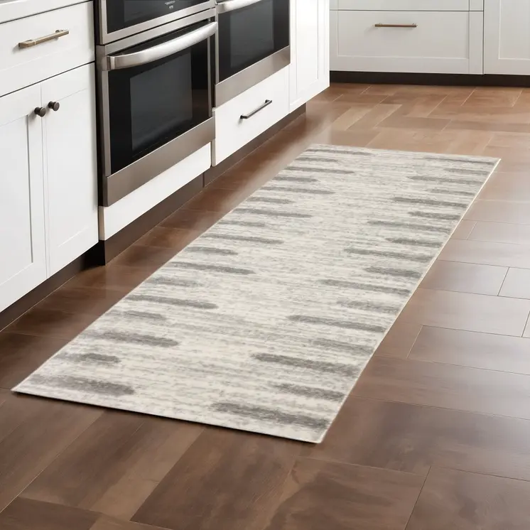 2' X 8' Ivory And Grey Geometric Shag Power Loom Stain Resistant Runner Rug