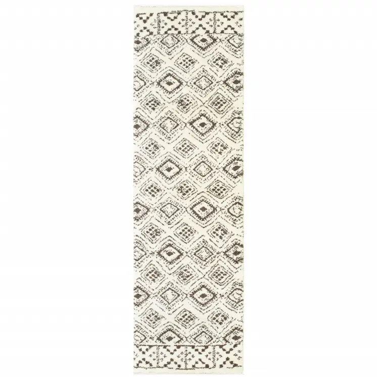 2' X 8' Ivory And Brown Geometric Shag Power Loom Stain Resistant Runner Rug