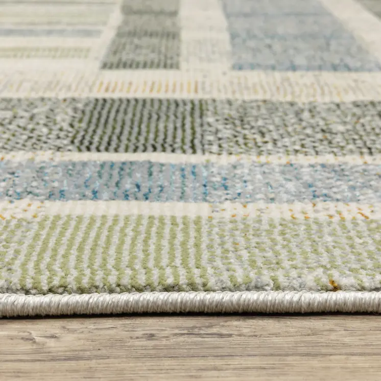 5' X 7' Gray and Ivory Geometric Power Loom Area Rug