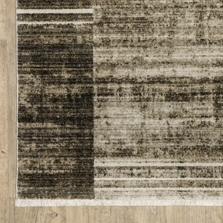 6' X 9' Beige Charcoal Brown Grey Tan Gold And Blue Geometric Power Loom Stain Resistant Area Rug With Fringe