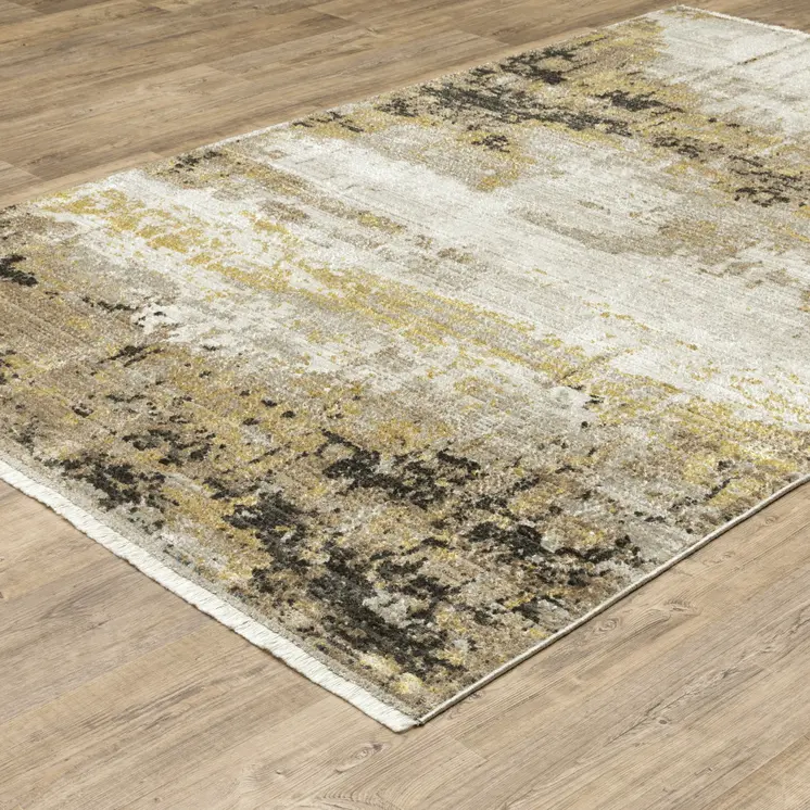 7' X 10' Gray and Black Abstract Power Loom Area Rug With Fringe